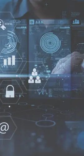 A person interacts with a futuristic holographic interface displaying various data visualizations and digital icons representing connectivity, security, and technology.