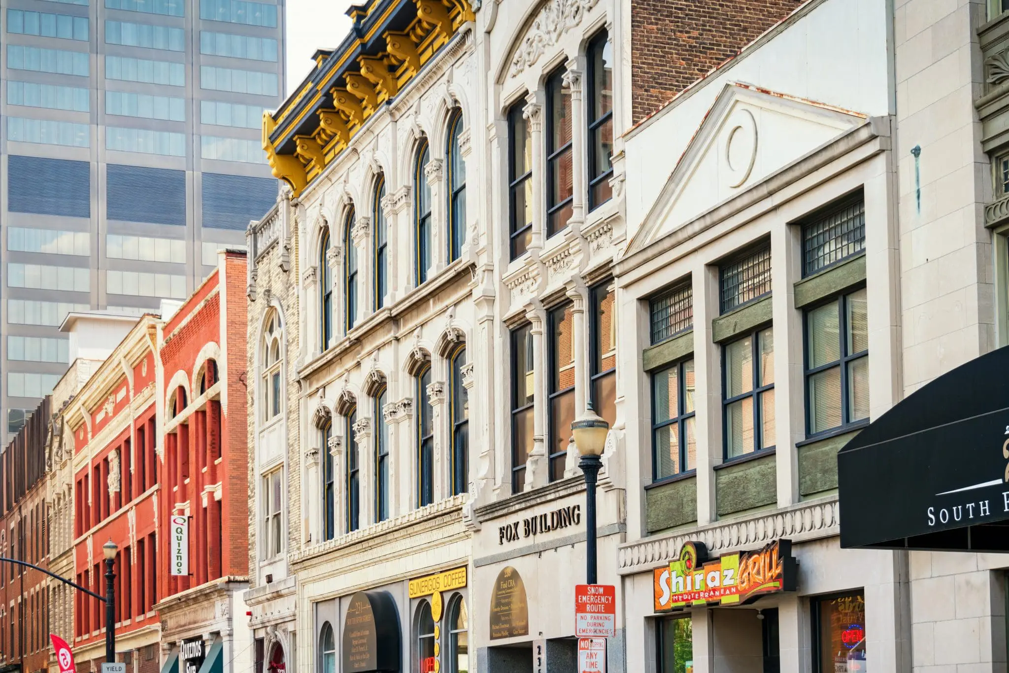 Rown of building facades in downtown Louisville, KY